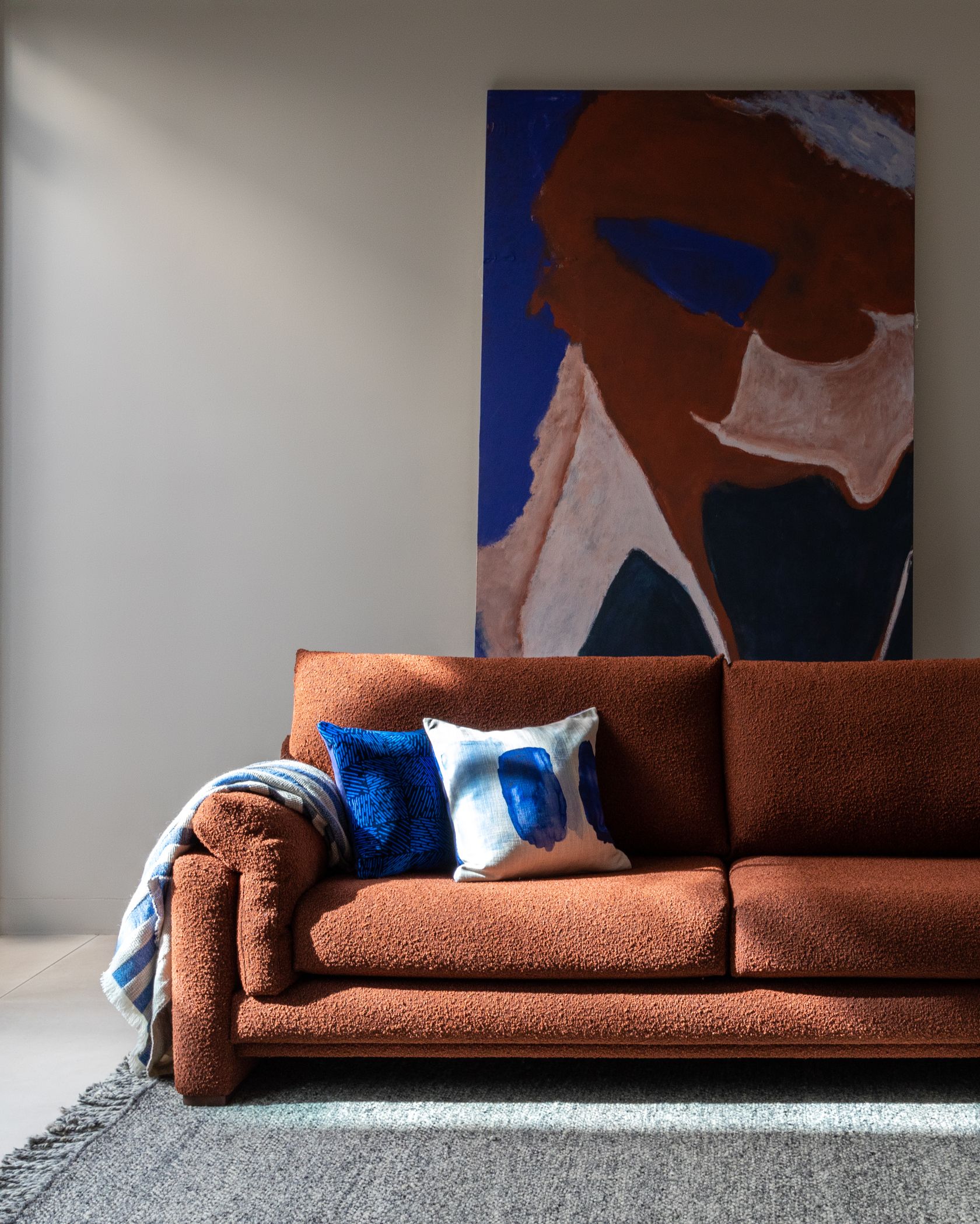 do noi that ghe sofa phong khach vai boucle